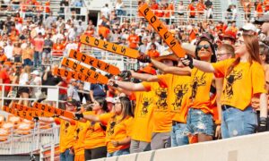 Oklahoma State fans make noise to support the Cowboys.